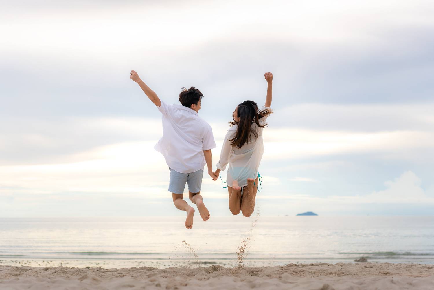 couple-jumping-1 mortgage free couple jumping for joy