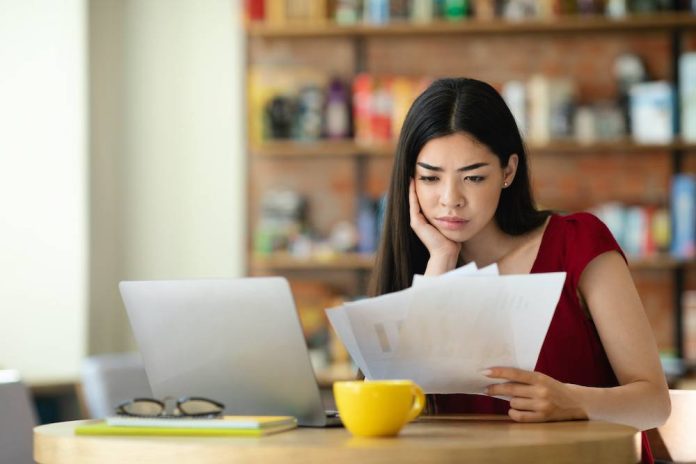 lady looking at finances and planning for retirement